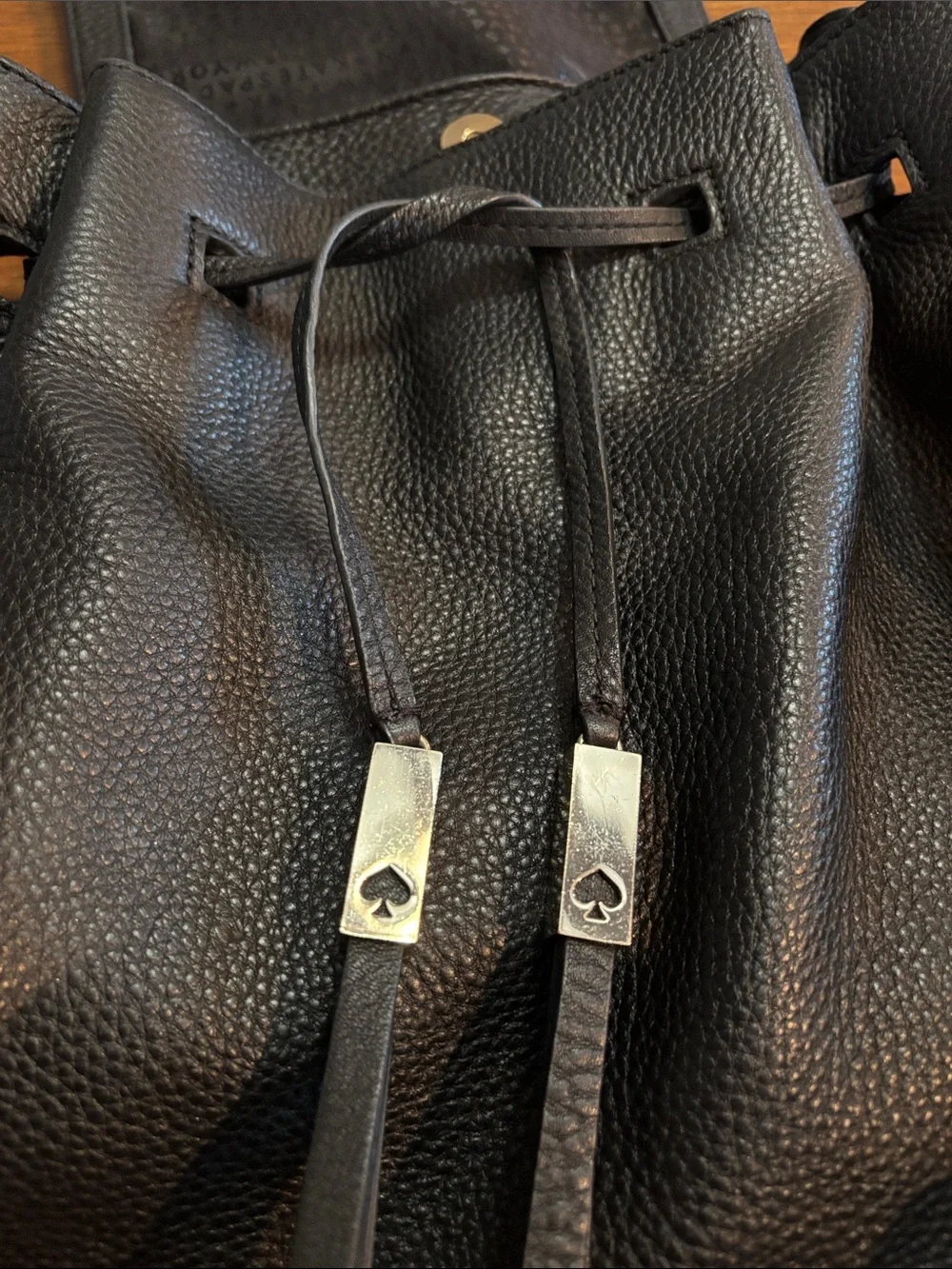 kate spade Black Pebbled Leather Drawstring Backpack Purse